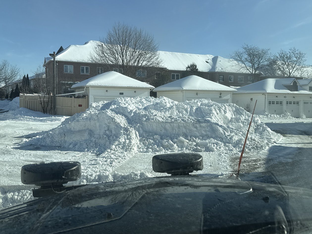 Snow accumulation and snow pile after clearing